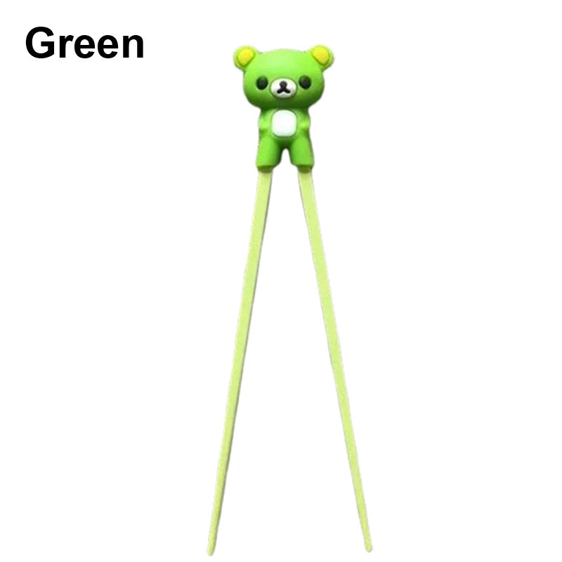 Green teddy bear-shaped kawaii chopstick holder on a white background