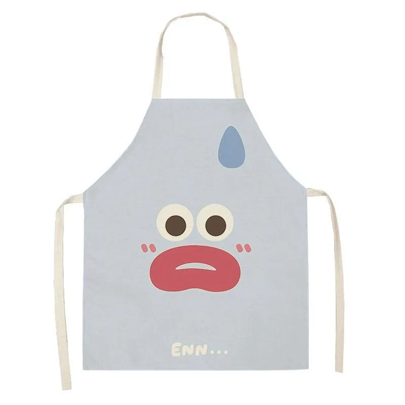 Children's kawaii apron with a cartoon face design on a white background