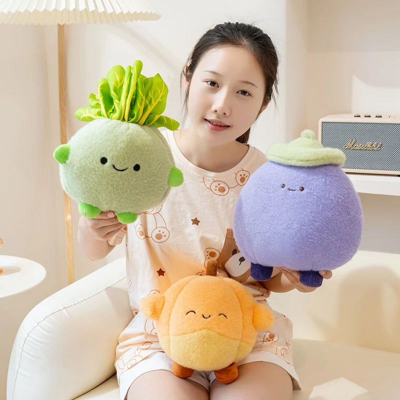 Person holding three kawaii plush toys shaped like vegetables in a living room.