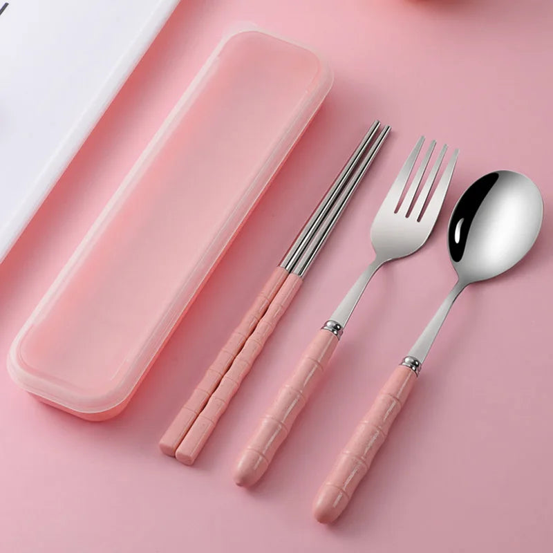Pink kawaii utensils set with case on a pink background
