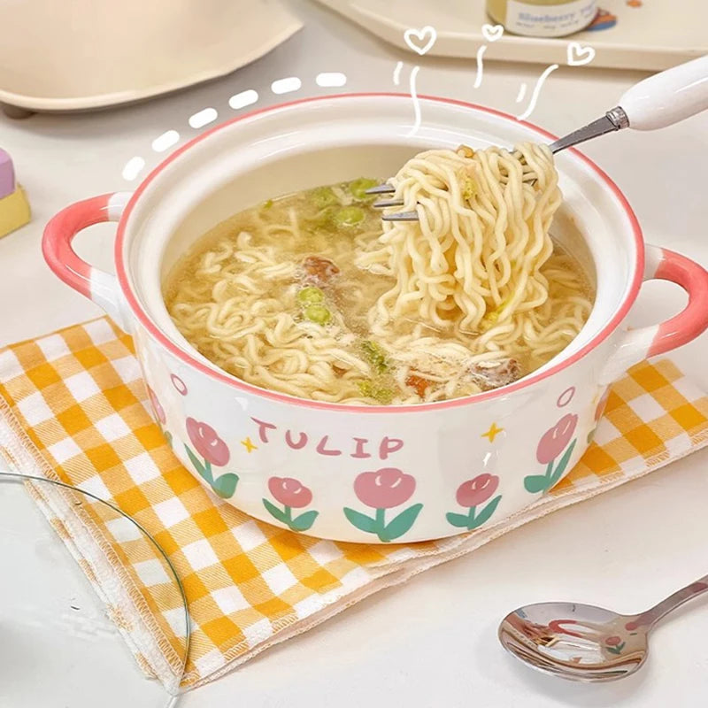 Noodle kawaii ramen bowl with floral design on a checkered cloth