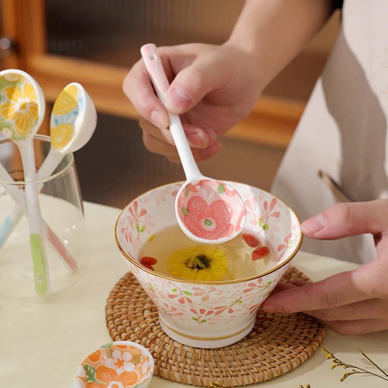 A person holding a kawaii spoon