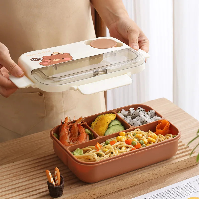 Person holding a kawaii bento box with compartments filled with food on a wooden table.
