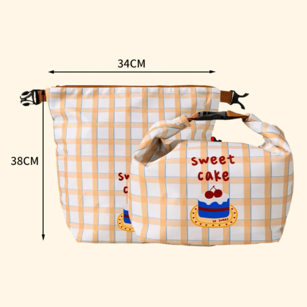 Plaid kawaii bag with 'sweet cake' text and measurements on a beige background