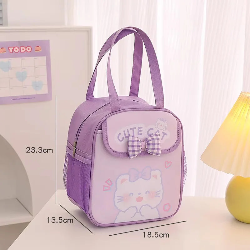 Purple kawaii lunch bag with a cat design and measurements on a table.