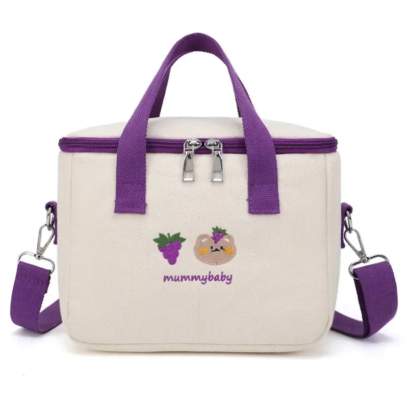 White kawaii lunch bag with purple handles and accents, featuring a cartoon character and 'mummybaby' text, on a white background.