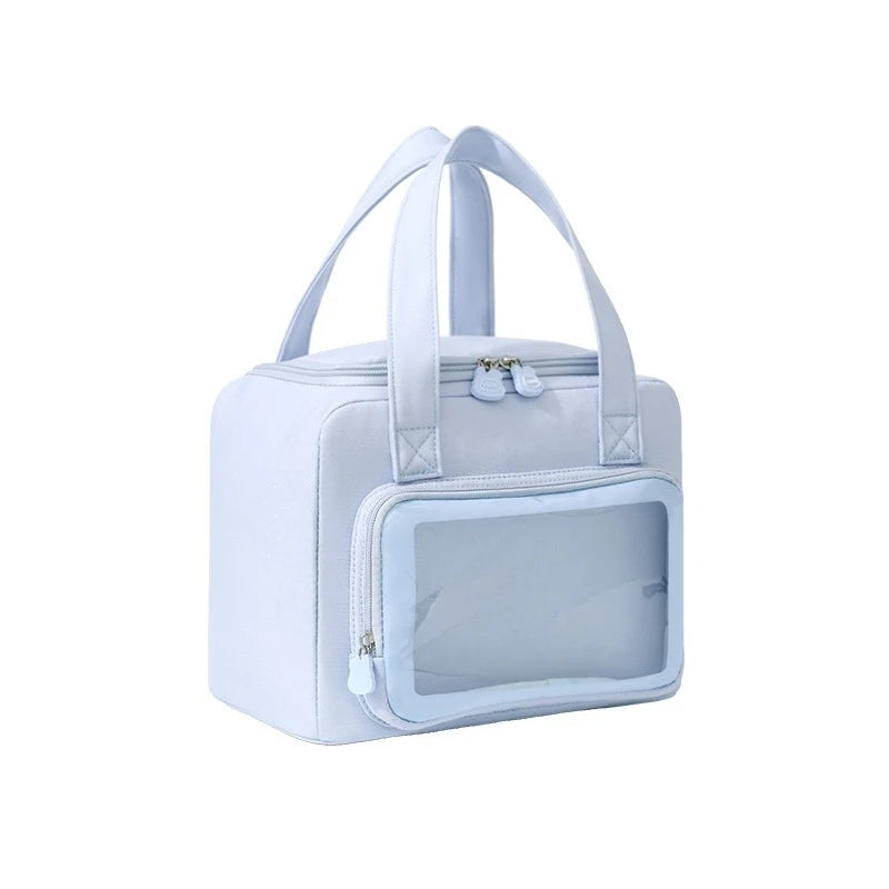 Light blue kawaii pet carrier with clear front panel on a white background