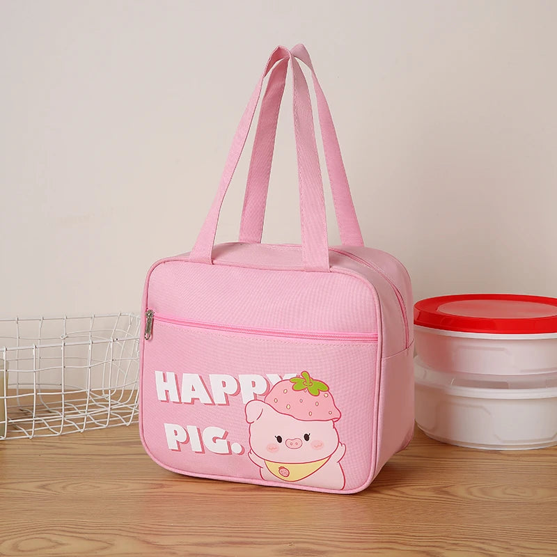 Pink kawaii bag with 'Happy Pig' design on a wooden surface