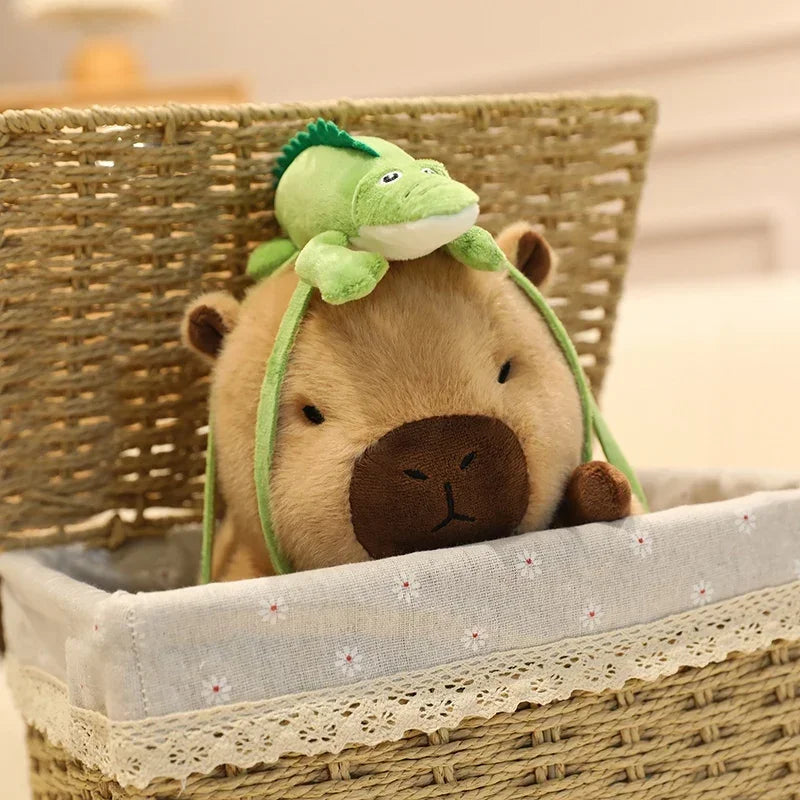 Kawaii stuffed animal with a green frog hat sitting in a woven basket.
