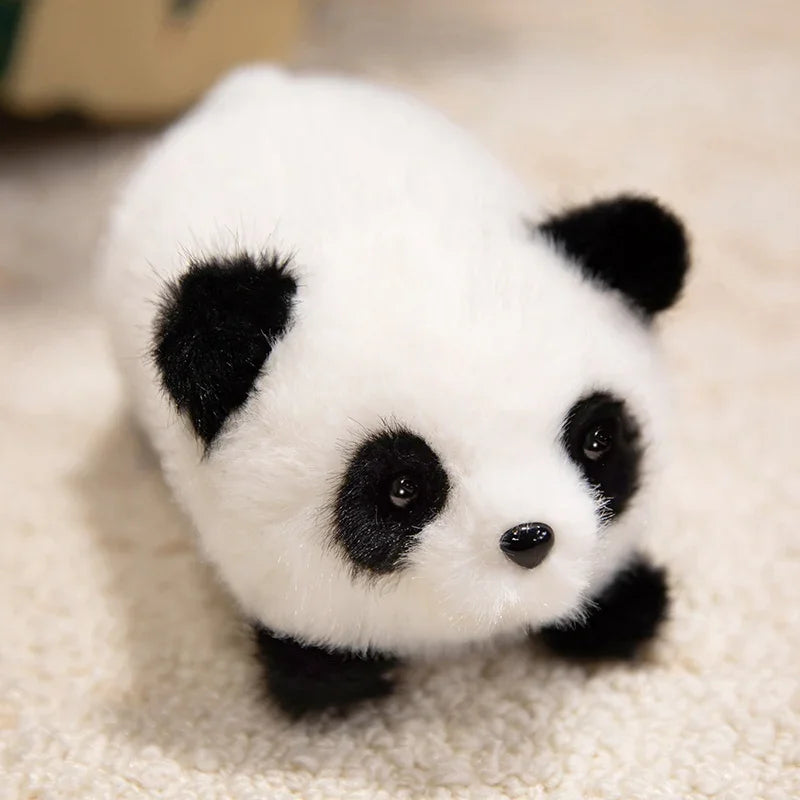 Kawaii plush panda toy on a beige surface