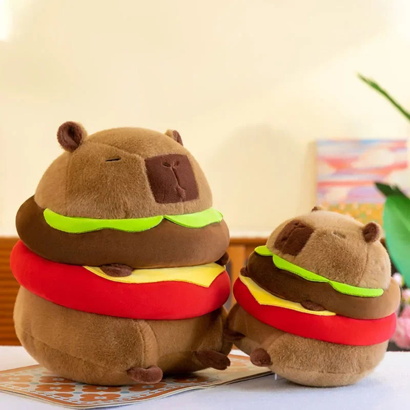 Two kawaii plush toys shaped like hamburgers on a table with a colorful background