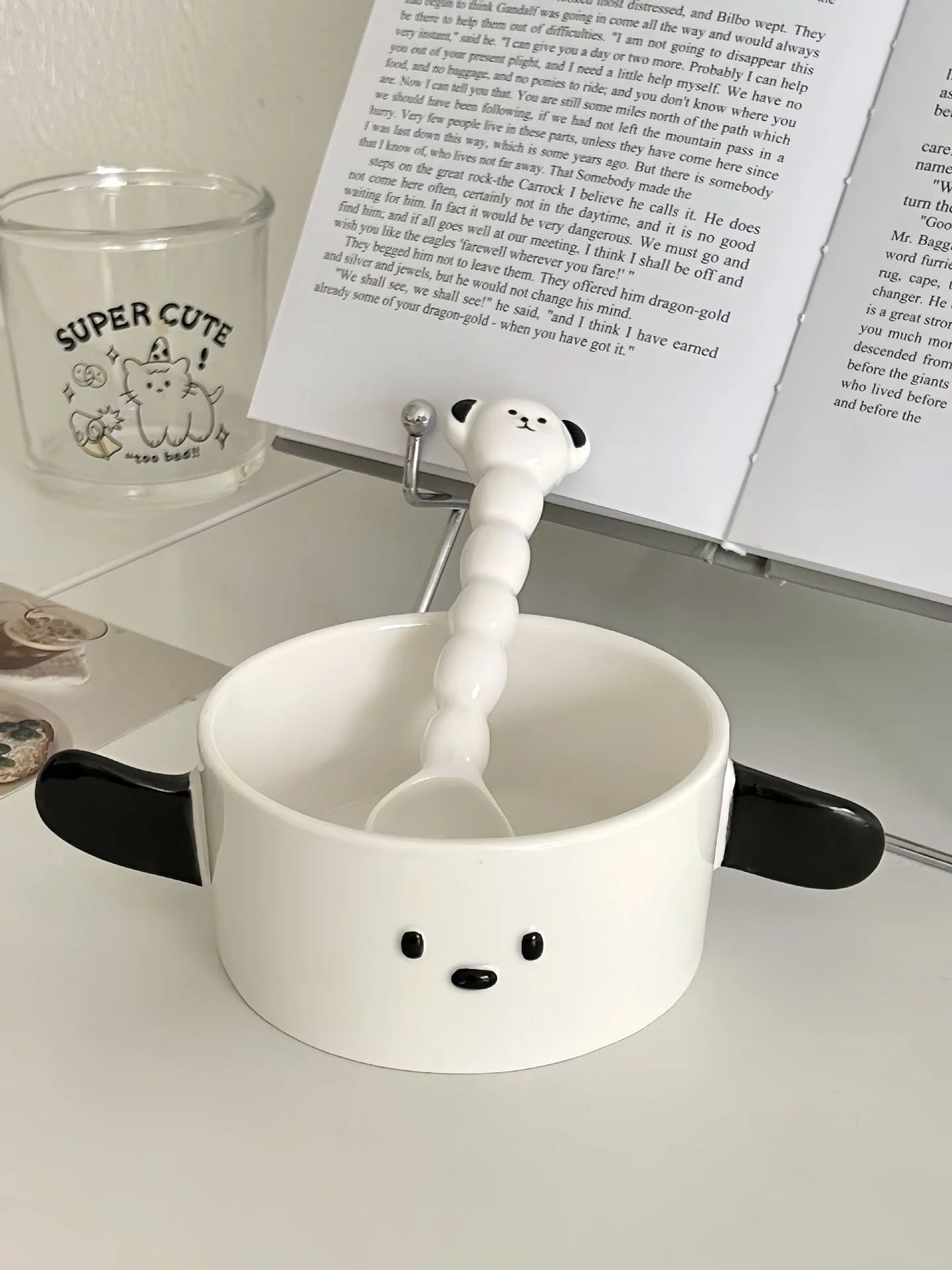 A dog themed kawaii ramen bowl with a spoon inside