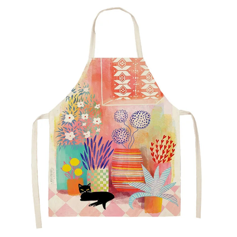 Colorful kawaii apron with floral and cat design on a white background