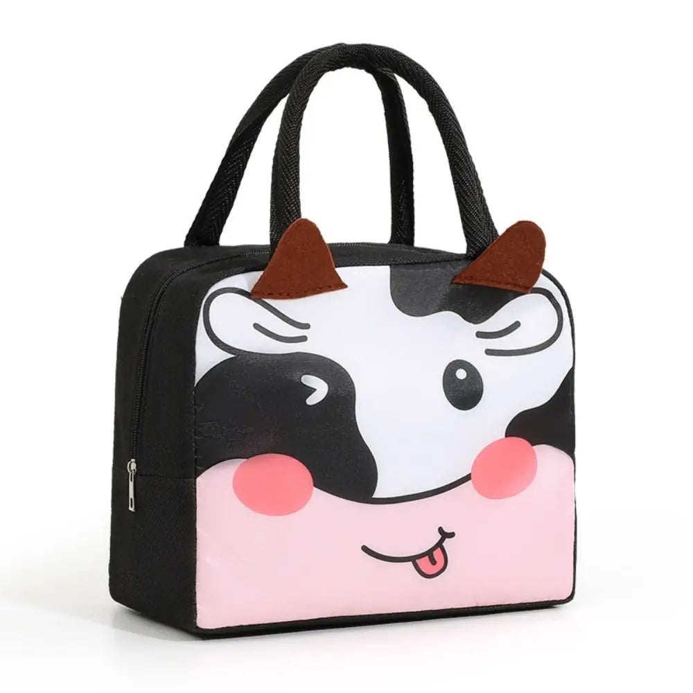 Black kawaii lunch bag with a cow design on a white background