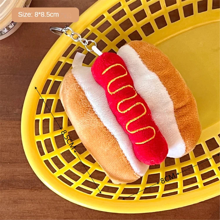 Hot dog-shaped kawaii keychain on a yellow basket with measurement markings