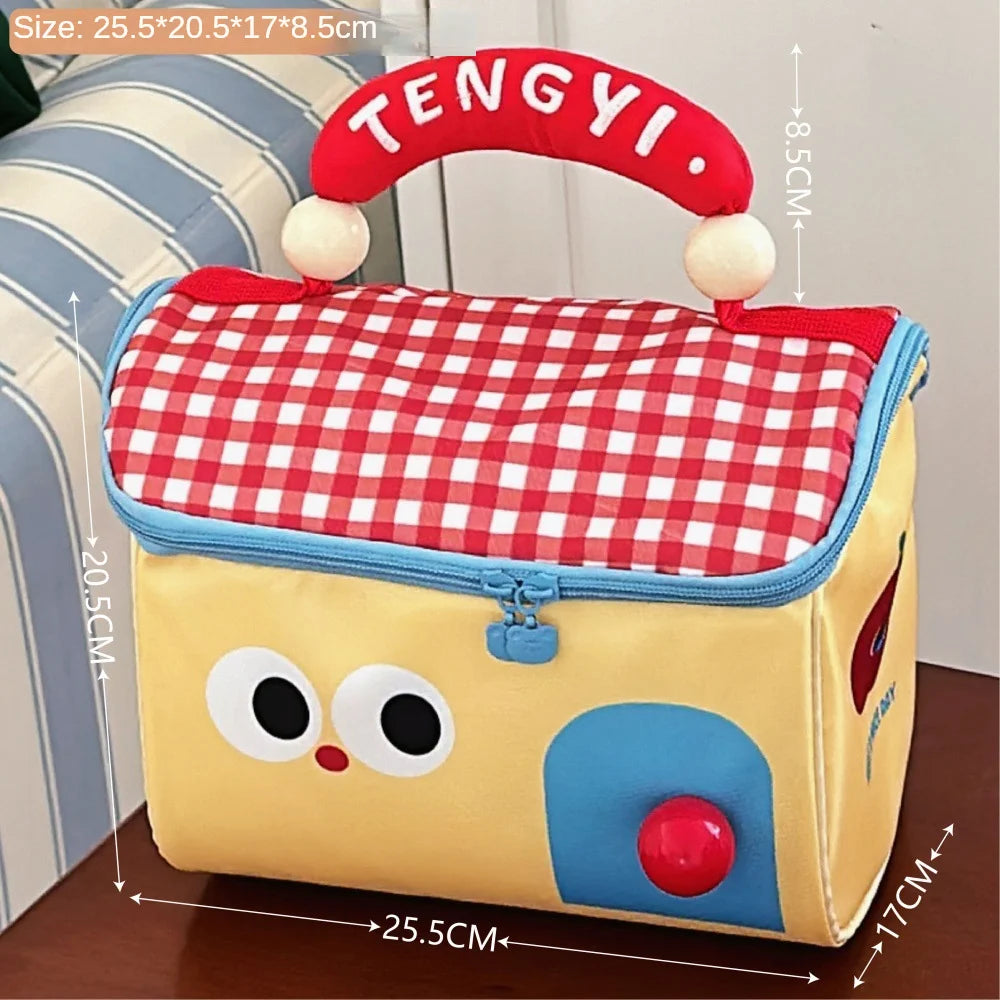 Cartoon-style kawaii lunch bag with red checkered lid and measurements on a striped couch background
