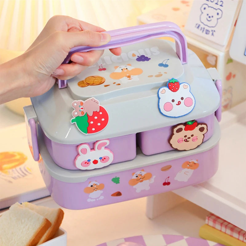 Cute, colorful kawaii bento box with cartoon character designs on a light background