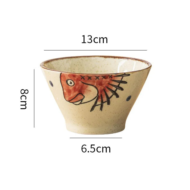 Ceramic kawaii ramen bowl with fish design and measurements on a white background