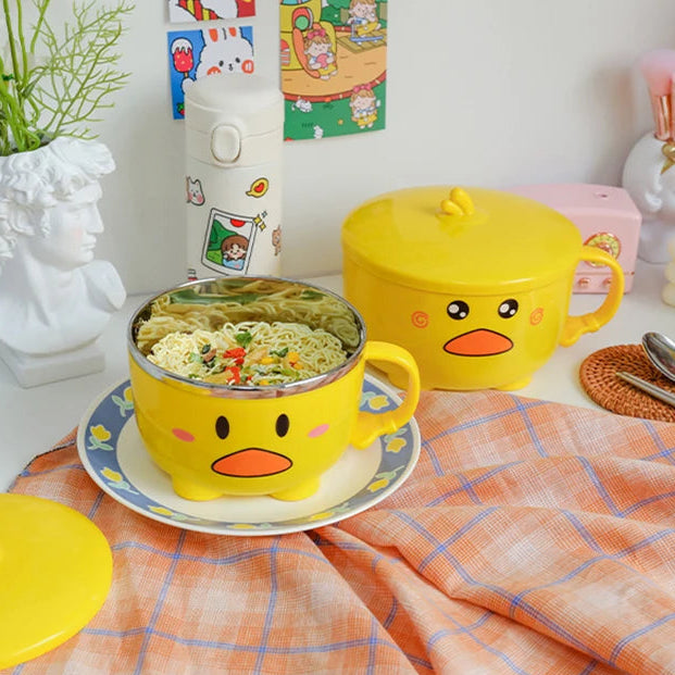 Two duck themed kawaii ramen bowls on a table