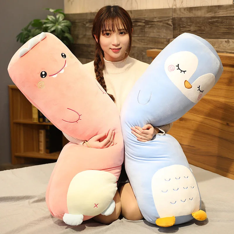 Person holding two large kawaii plush toys shaped like a pink cat and a blue penguin.