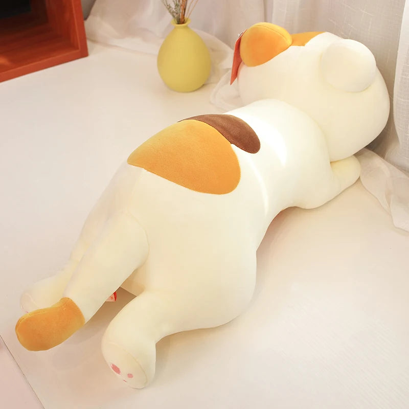 Plush kawaii toy resembling a dog with brown spots on a light background
