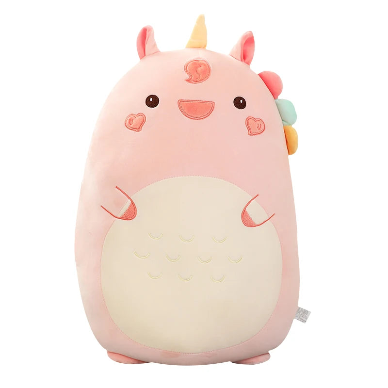 Cute kawaii plush toy with a pink body and rainbow-colored horns on a white background
