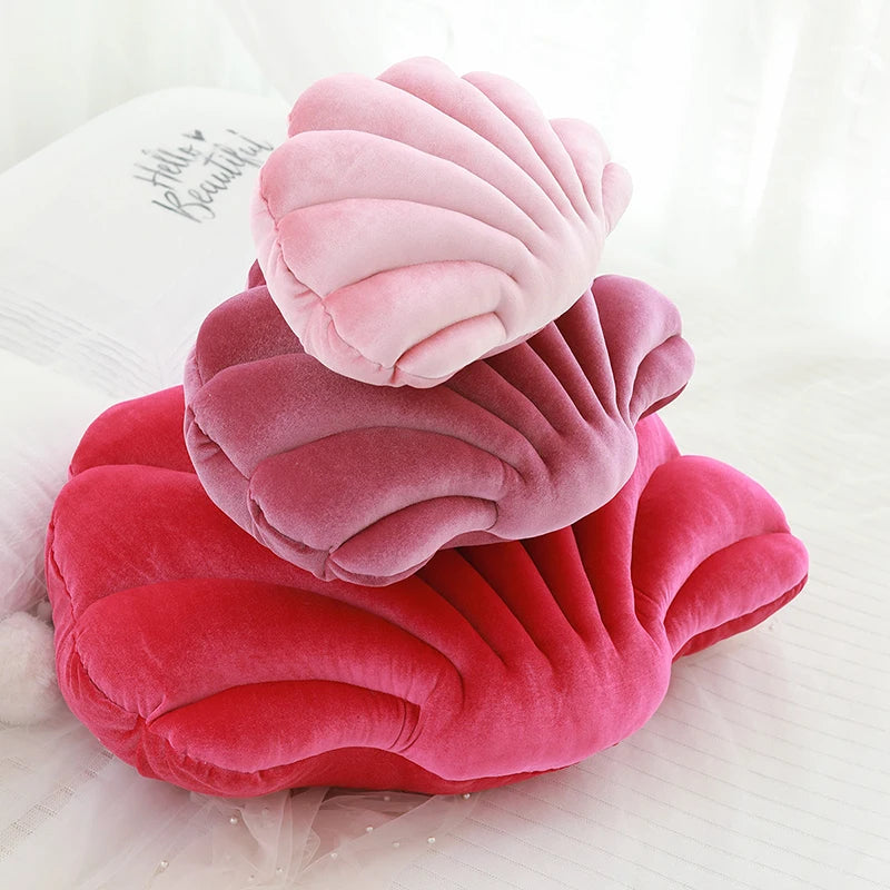 Pink and red cloud-shaped kawaii pillow on a white background