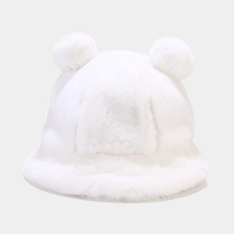 White fur Kawaii hat with pom-poms on a light gray background