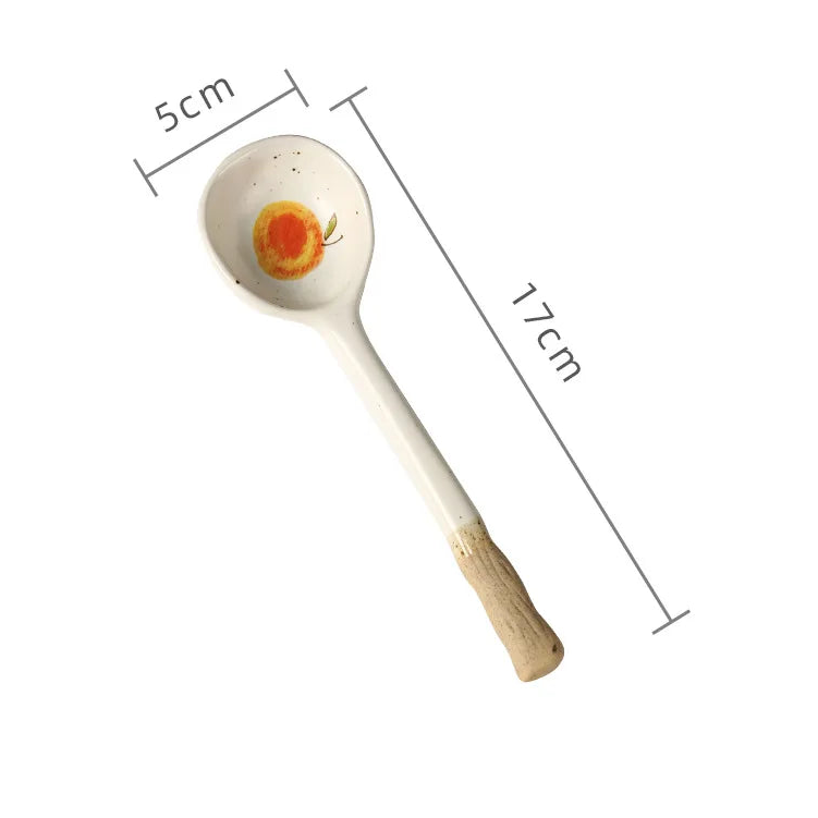 A white ceramic kawaii spoon with measurements 