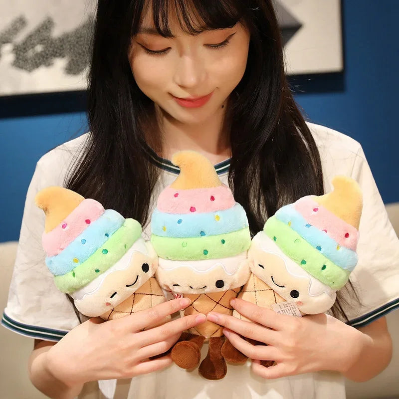 Person holding kawaii plush ice cream toys with a blue wall in the background