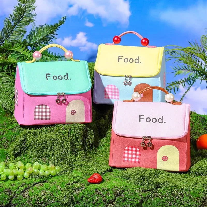 Three colorful kawaii bags on a grassy background with plants and blue sky.
