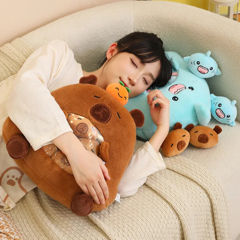 Person lying on a bed with kawaii plush animal toys