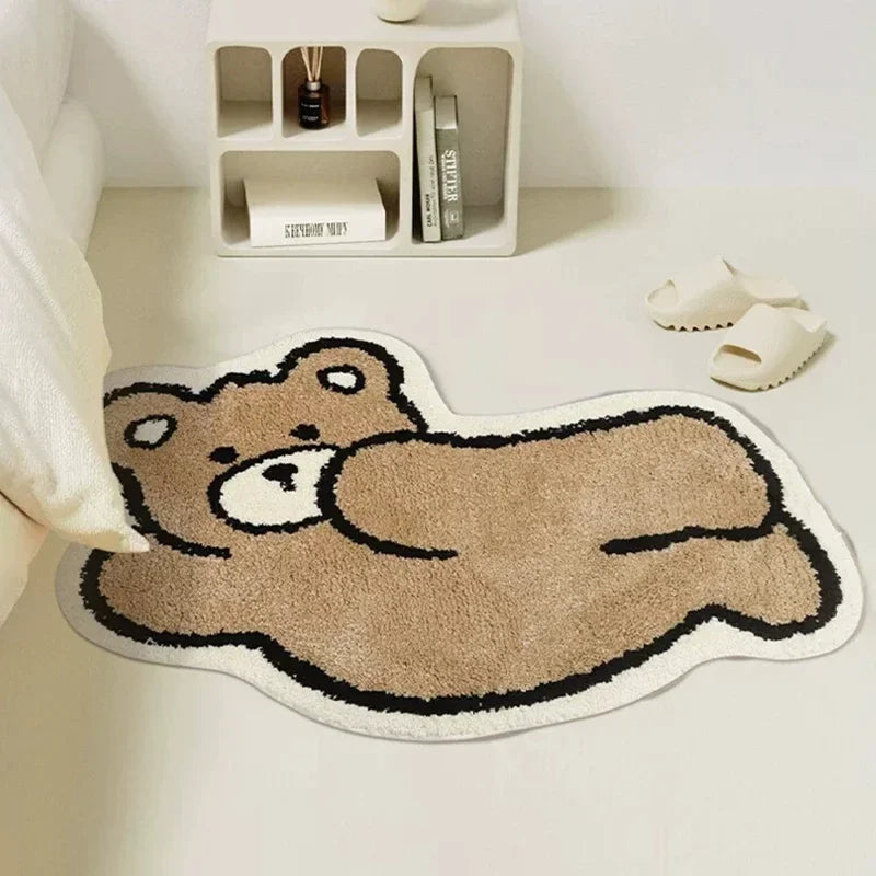 Kawaii bear-shaped rug on a light-colored floor with a shelf in the background.
