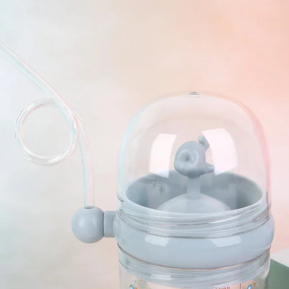 Gray kawaii bottle with a transparent cover on a light pink background
