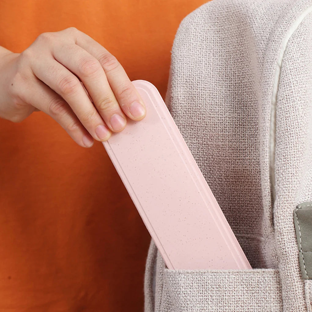 Person placing a pink kawaii utensils into a gray backpack against an orange background