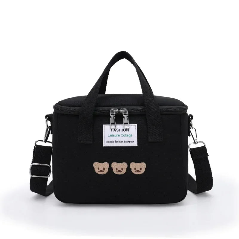 Black kawaii bag with bear designs and a visible brand label on a white background