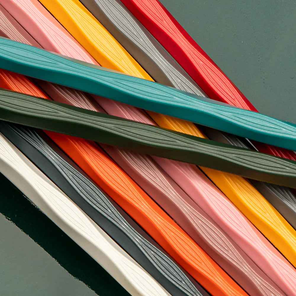 Close-up of kawaii colorful ribbons in various shades on a dark background