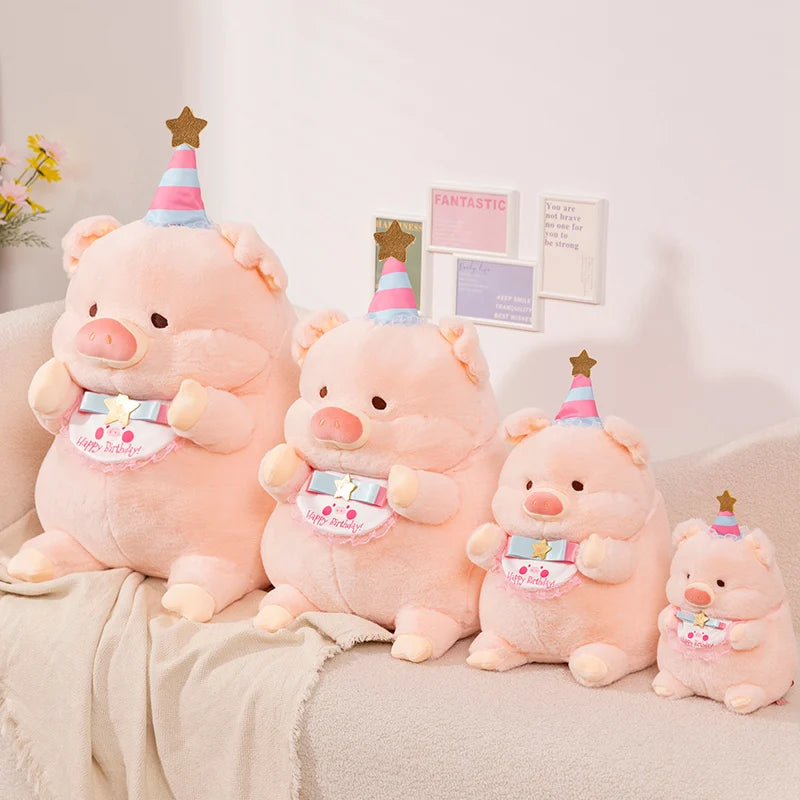 Set of pink kawaii plush pigs with party hats on a beige couch.