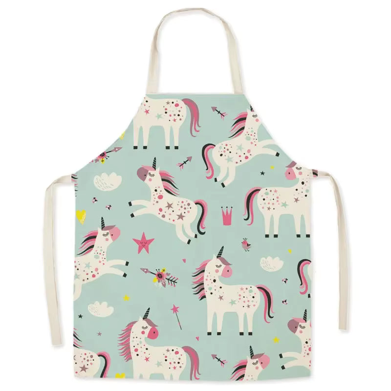 Children's kawaii apron with unicorn pattern on a light blue background