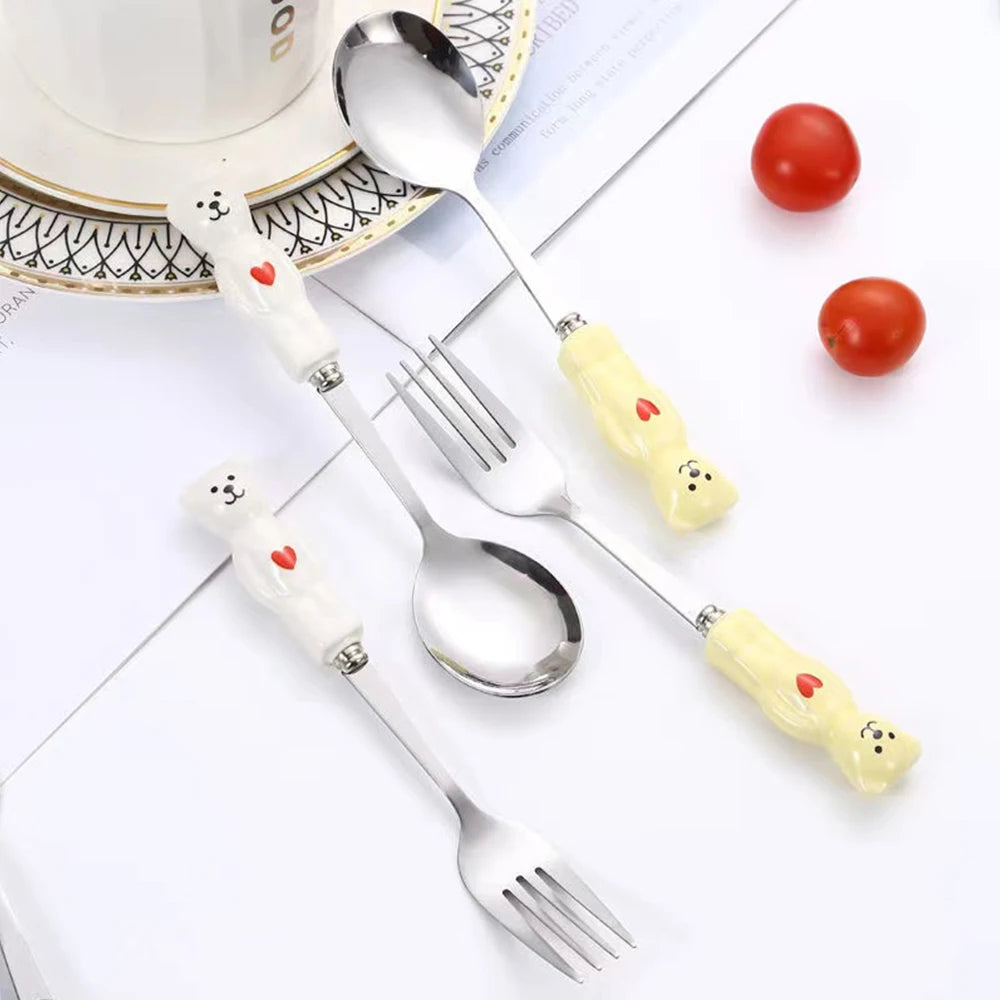 A group of yellow and white kawaii utensils on the table