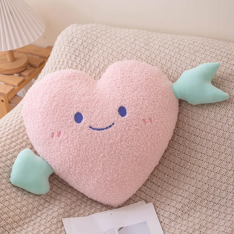 Heart-shaped kawaii plush toy with a smiling face on a textured surface