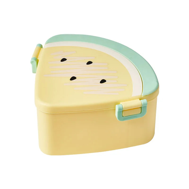 Yellow fruit-shaped kawaii food container with green lid on a white background