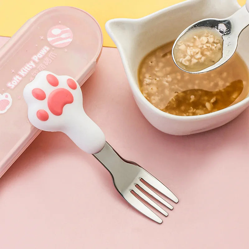 A pink and white paw shaped kawaii utensils