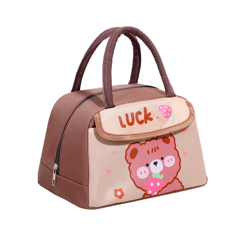 Small brown kawaii lunch bag with a pink bear design and 'LUCK' text on a white background