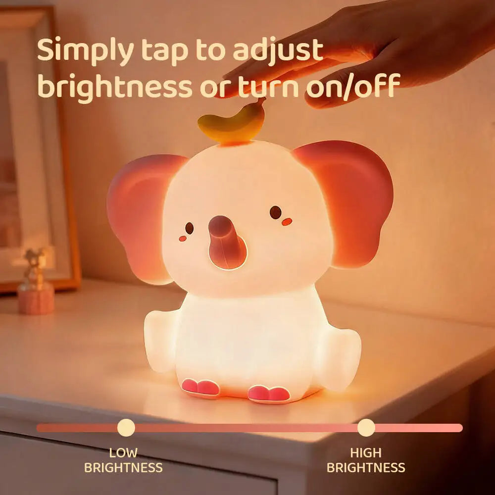 Dog-shaped kawaii night light with a hand adjusting it on a surface.