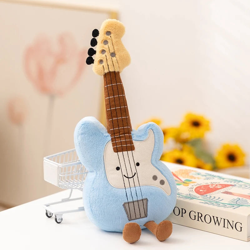 Kawaii plush toy guitar with a smiling face on a surface with a blurred background