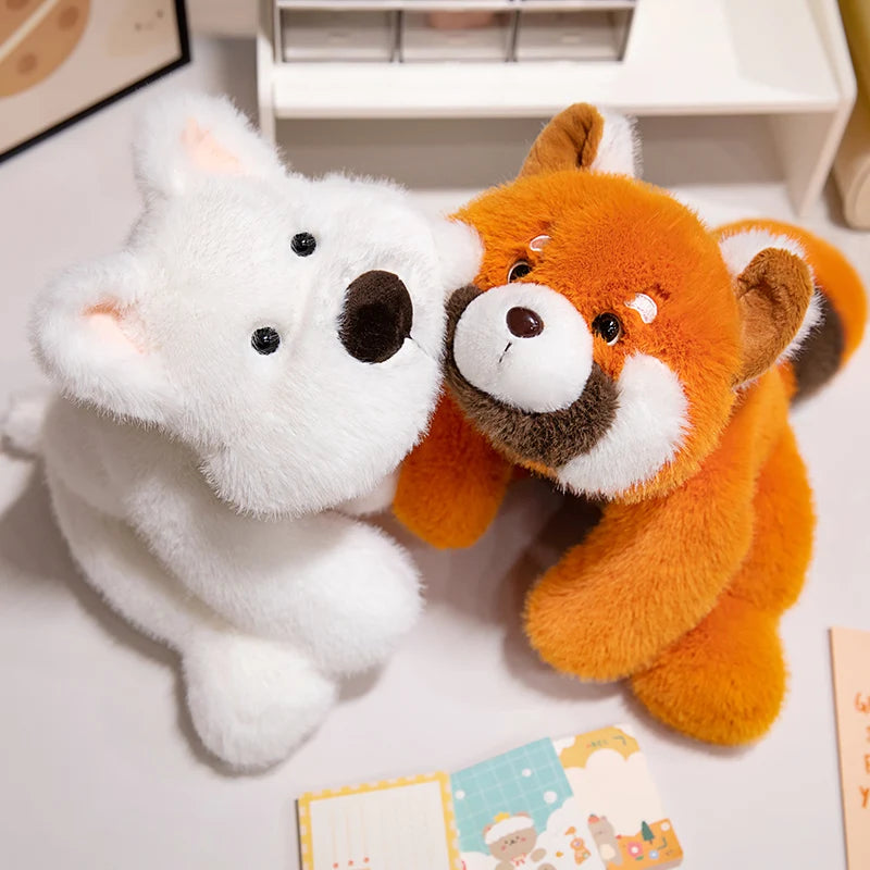 Two kawaii plush toys, a white bear and an orange fox, sitting together on a light surface.