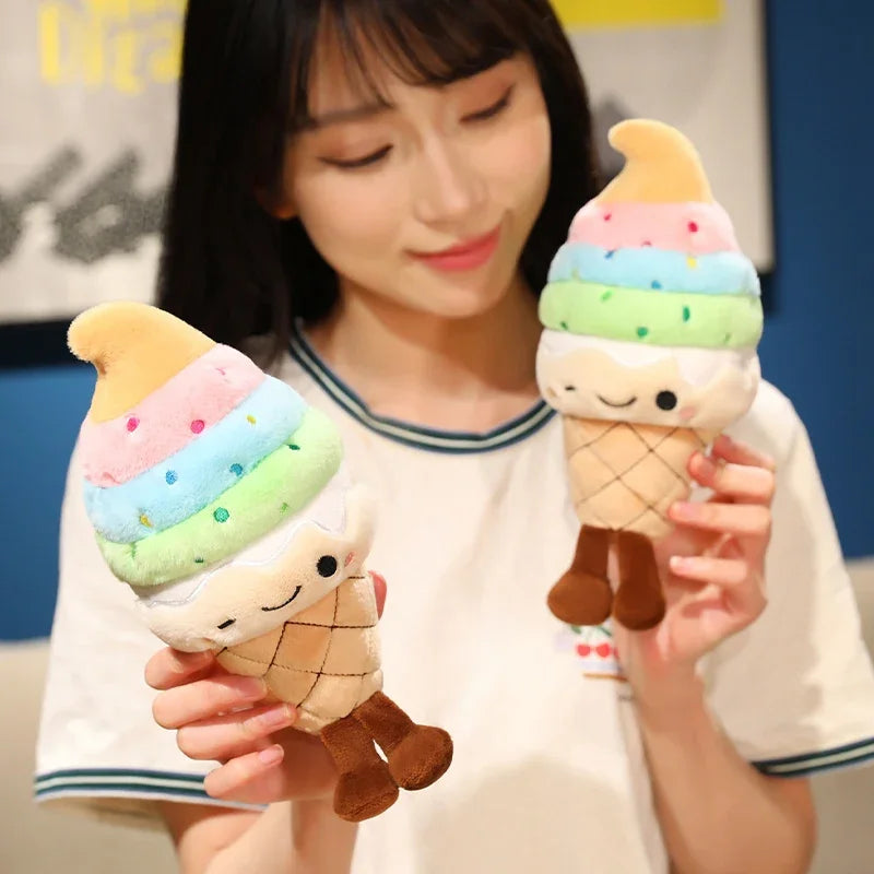 Person holding two kawaii plush ice cream toys with colorful toppings and smiling.