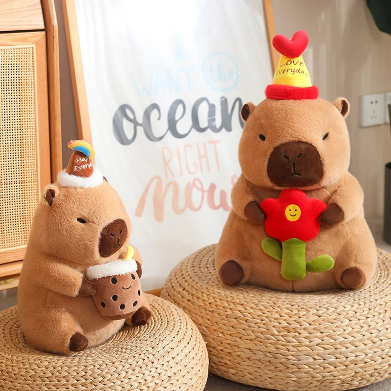Two capybara plush toys resembling beavers on woven stools with a decorative background.