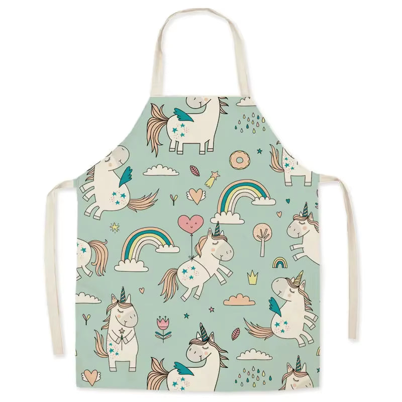 Children's kawaii apron with unicorn and rainbow pattern on a light blue background